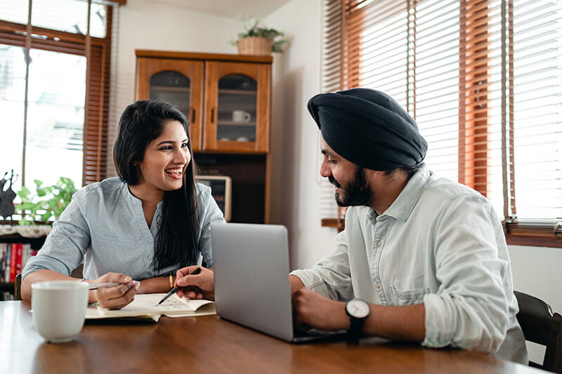 First time homebuyers checking their credit scores