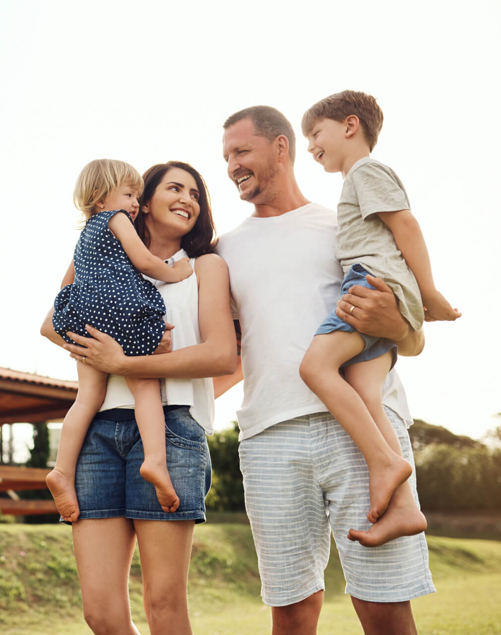 CrossCountry Mortgage couple holding their child photo.