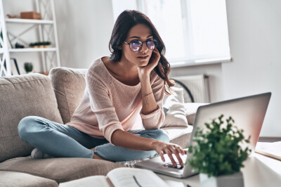 Woman researching refinance options