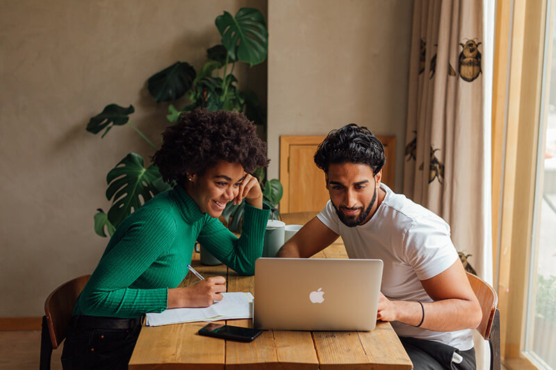 students on laptop