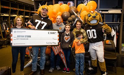 The Stork family receiving the grand prize from CCM