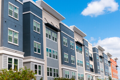 The outside of a condo or a co-op apartment building in New York City.