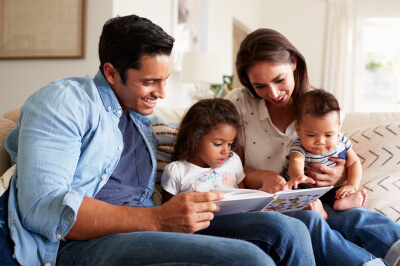 Family reading a book