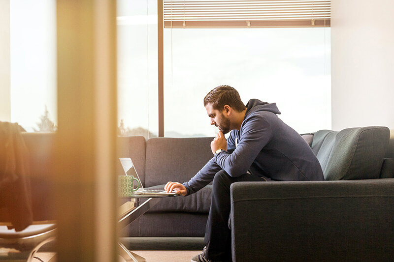 A man filling out a mortgage loan application