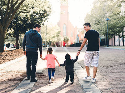 Couple and their family enjoying their new neighborhood