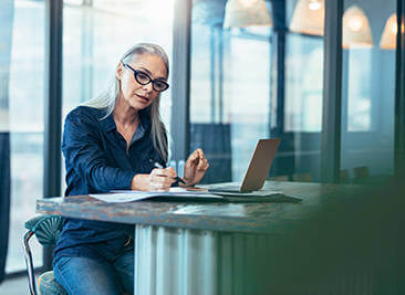 A woman researching HECM loans