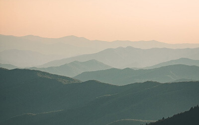 The horizon with mountains and fog.