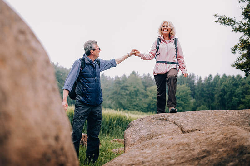 An older couple hiking