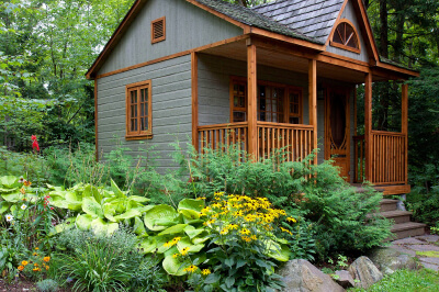 Exterior view of an accessory dwelling unit (ADU) showcasing a detached structure with modern architecture and landscaping.